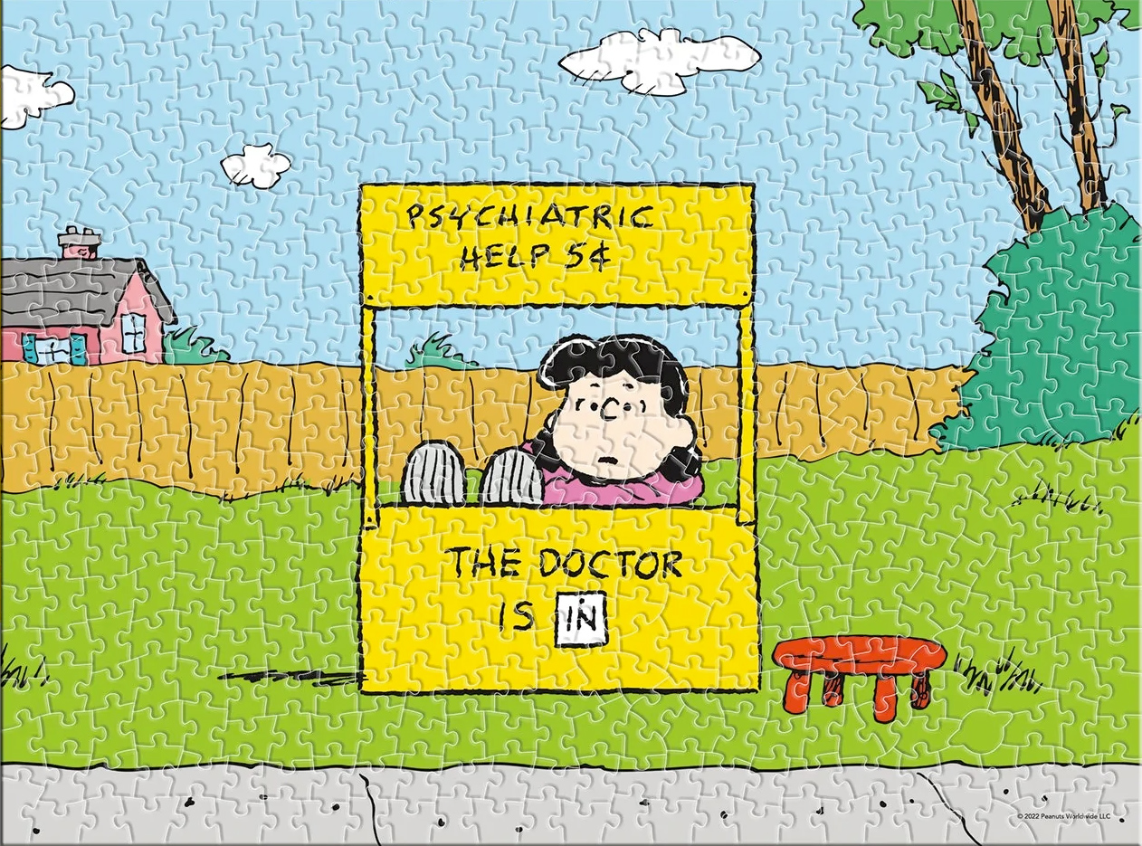 Quebra-Cabeça Peanuts Estande de Ajuda Psiquiatra da Dra. Lucy com 500 peças