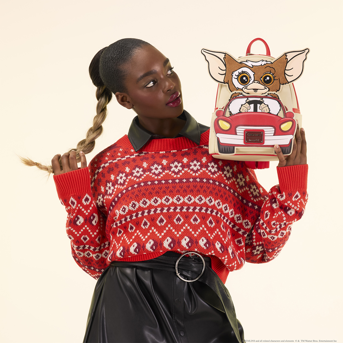 Mini-Mochila Gremlins com Gizmo no Carro