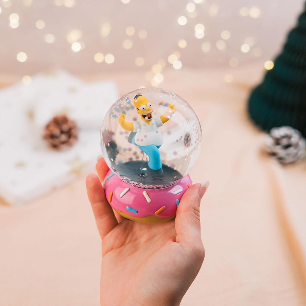 Globo de Neve Os Simpsons com Homer Saltitando e base de Donut Rosa
