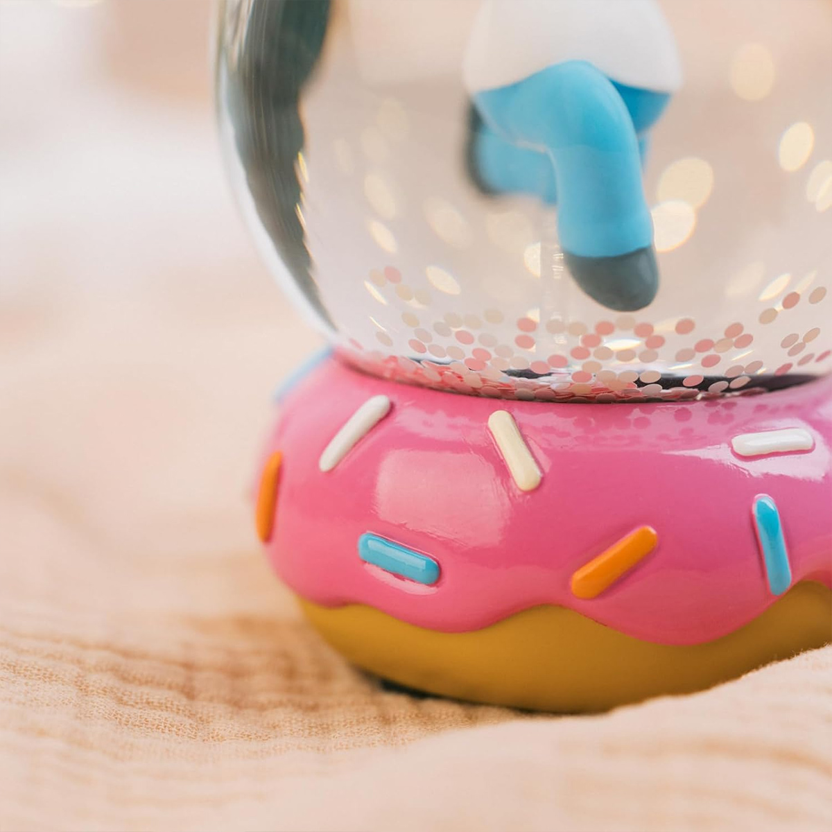 Globo de Neve Os Simpsons com Homer Saltitando e base de Donut Rosa