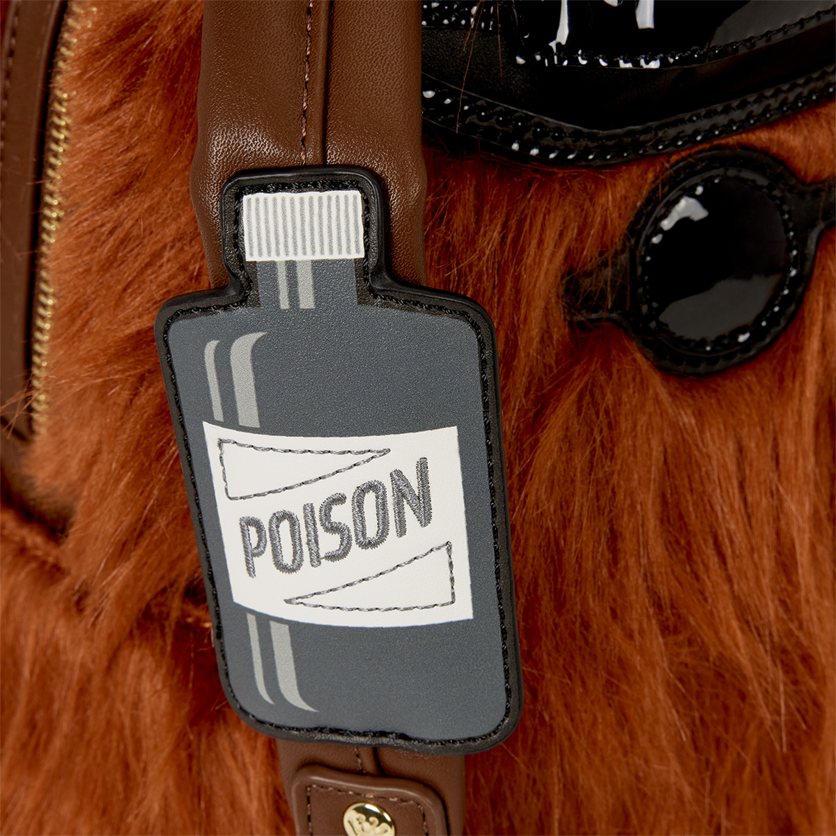 Mini-Mochila Peluda do Primo Coisa da Família Addams